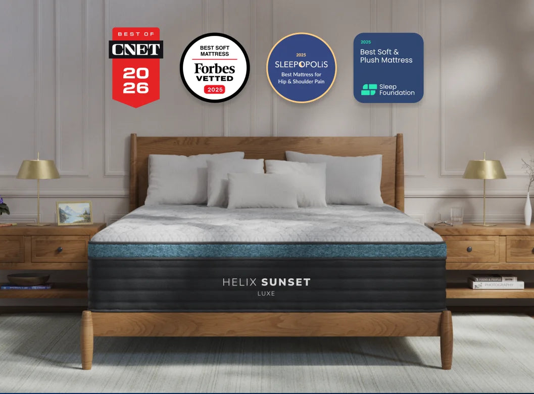 Helix Sunset mattress in a bedroom setting with various awards displayed above it.